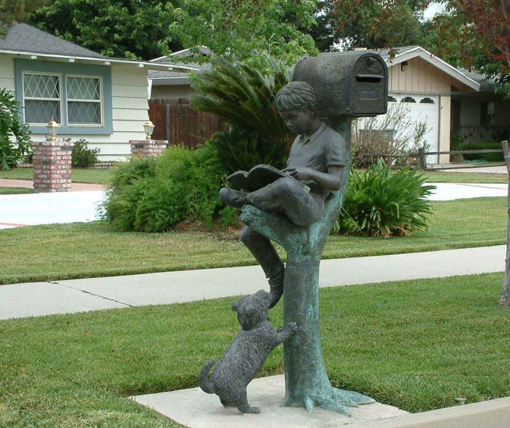 Reading by the Street Mailbox